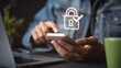 © BoOm - A person using a smartphone with a digital lock symbol. Focus on securing mobile devices in a modern workspace. Highlights the importance of digital security and privacy.