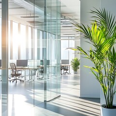 Canvas Print - Modern office space with glass walls and greenery, showcasing a bright and productive environment.