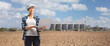 © Ljupco Smokovski - Young female farmer using a laptop computer on a field