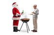 © Ljupco Smokovski - Santa claus making a bbq and talking to an elderly man
