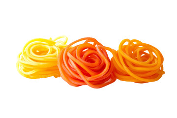 Colorful pasta roses in yellow, orange, and red on a white background, perfect for culinary presentations or food photography.