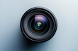 © Alina - New camera lens on grey background