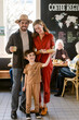 © ByLorena/Stocksy - Family Enjoying Coffee Shop
