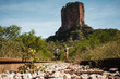 © Luis Herrera/Stocksy - couple travel holding hands in beautiful landscape