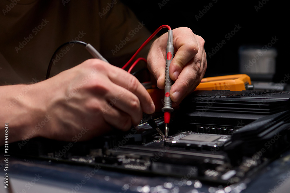 Hands Engaged in Working with Various Electronic Components and ...