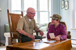© Raymond Forbes LLC/Stocksy - Senior Veteran family Great Grandfather with Grandson smiling