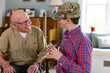© Raymond Forbes LLC/Stocksy - Veteran family Great Grandfather  Grandson Learn about  dog tag