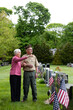 © Raymond Forbes LLC/Stocksy - Senior military Veteran in cemetery
