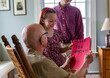 © Raymond Forbes LLC/Stocksy - Girl hands card portrait thanking veteran tribute with brother