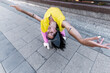 © Manu Prats/Stocksy - Expressive Dancer Backbend in City Street