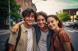 © StockMediaRaw - Three people are smiling and posing for a picture on a city street