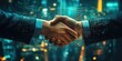 © Orod - business handshake with a digital overlay of a city skyline at night