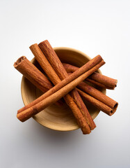 cinnamon sticks, isolated on a clean white background