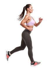 Canvas Print - Woman in sportswear running on white background