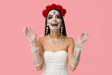 Poster - Beautiful young woman dressed as dead bride for Halloween party on pink background