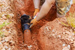 © ungvar - An underground storm sewer pipe has been replaced to replace damaged drainage system for collecting rainwater.