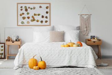 Sticker - Interior of light bedroom with pumpkins and autumn leaves