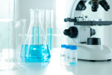 analyze biochemical samples in advanced scientific laboratory. medical professional use microscope l