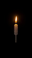 Wall Mural - Elegant Flame Captivating Image of a Candle with a Soft Glow Against a Dark Background, spooky season skeleton candle