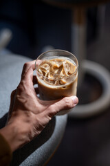 Wall Mural - glass of coffee with milk on the table