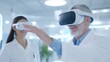 © Chaikit - male patient wearing vr headset, female doctor in
