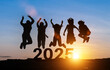© banphote - Happy group of people celebrate jump for new year 2025. concept for win victory. silhouette of friends jumps at sunset time on mountains.
