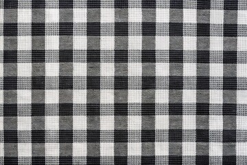 Black and white checkered pattern with reflection on fabric texture