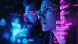 © Curioso.Photography - Two people wearing glasses analyzing code or data in a dark environment, illuminated by neon pink and blue lights.