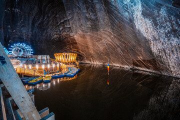 Underground theme park in big salt mine Salina Turda, Turda in Romania, transylvania. Popular tourist destination.