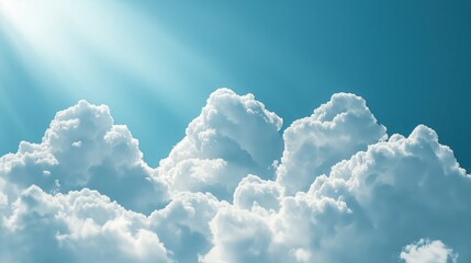 Close-up of puffy white clouds drifting across a bright blue sky