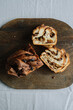© Adrian Cotiga/Stocksy - Artistic presentation of nutty bread on rustic board