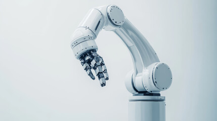 Poster - A silver robotic arm stands out against a white backdrop. Its mechanical hand, part of an industrial robot, represents the latest advancements in manufacturing technology.