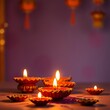 © Swadip - Clay Diya lamps lit during Diwali Festival celebration, Happy Diwali