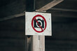 © VICTOR TORRES/Stocksy - No Photography Allowed Sign on Wooden Post with Red Circle and Slash