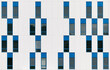 © VICTOR TORRES/Stocksy - Modern building facade with blue and white geometric windows