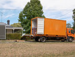 © Rowena Naylor/Stocksy - Removal truck ready to load house contents