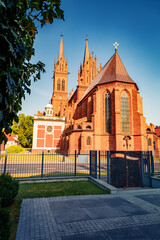 Colorful summer cityscape of Wloclawek town, Poland, Europe. Beautiful morning view of Basilica Cathedral of St. Mary of the Assumption. Traveling concept background.