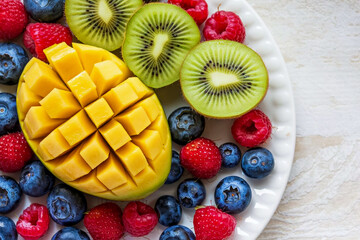Poster - Bright and fresh fruit salad, expertly arranged on a snow-white background