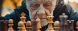 © Katavudh - Close-up of elderly seniors learning to play chess detailed textures and precision