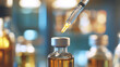 © Nazlykhan - Syringe piercing medicine vial with focused yellow liquid for healthcare and medical care concepts