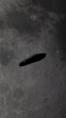Wall Mural - Vertical Video of Oumuamua Asteroid Interstellar Comet Visitor to Solar System Passing by the Moon with Crater Details Visible. 3D Science Space Animation.