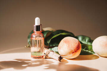 Natural cosmetics, hair and skin care. Organic peach oil. Glass bottle with essence. High quality photo