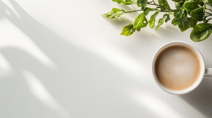 Poster - An overhead shot of a steaming cup of coffee, accompanied by lush green leaves casting intriguing shadows, offering a refreshing and invigorating visual experience.
