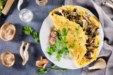 Wall Mural - Mushroom omelette on a plate. Perfect for a nutritious breakfast or brunch