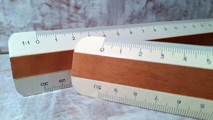 Wooden ruler 30 centimeters vintage with close-up and copy space