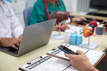 Wall Mural - Businessman shaking hands with doctor in conference room Doctor and pharmacist shaking hands in medical office Salesman with new medicines shaking hands in hospital with medical team