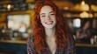 © Mandeep - Smiling redhead woman with wavy hair