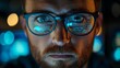 © kayudamar - Close-up of a Man's Face with Computer Code Reflected in His Glasses