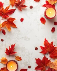 Wall Mural - autumn themed candles and leaves composition on light background