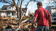 © Екатерина Чумаченко - In The Aftermath. A Strong Man Helping his Local Community Clearing Debris After Stormy Weather